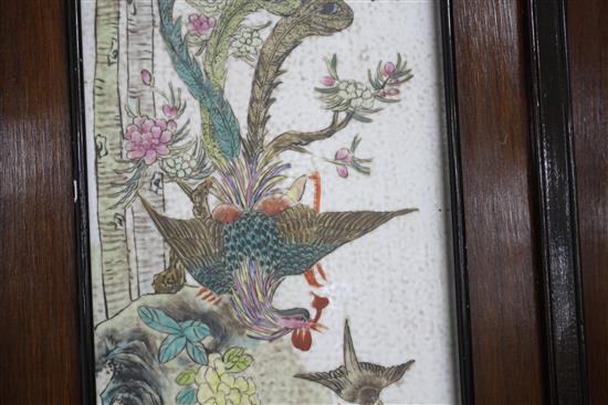 A pair of Chinese porcelain panels, painted with birds and inscribed, 73cm x 18cm